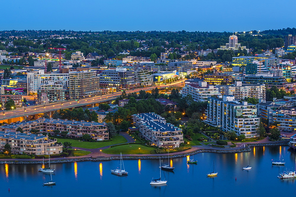 Aerial view at dusk, showing Cambie Street Bridge, Fairview, False Creek, and City Hall, Vancouver, BC, Canada