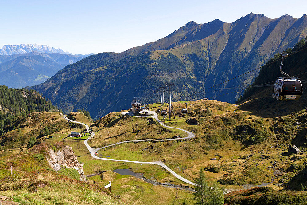 View towards the mid-station of the Panoramabahn gondola style cable car on the Kitzsteinhorn mountainside, Austria, Europe