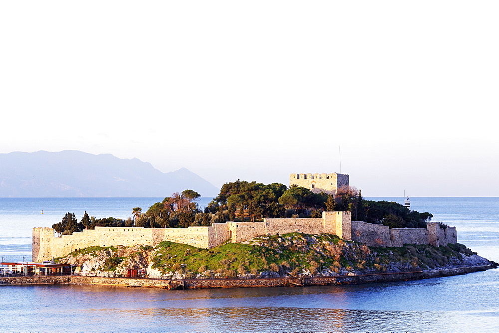 The Byzantine era fortress on Guvercin Ada (Pigeon Island), looking into the Aegean Sea, in the harbour of Kusadasi, Turkey, Asia Minor, Eurasia