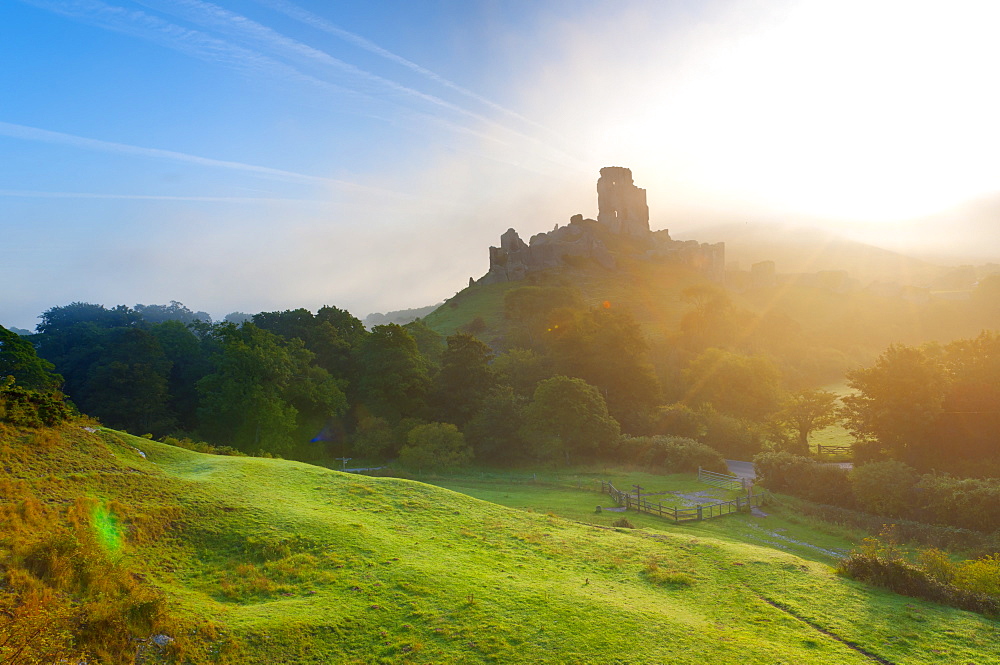 Corfe Castle at sunrise, Dorset, England, United Kingdom, Europe