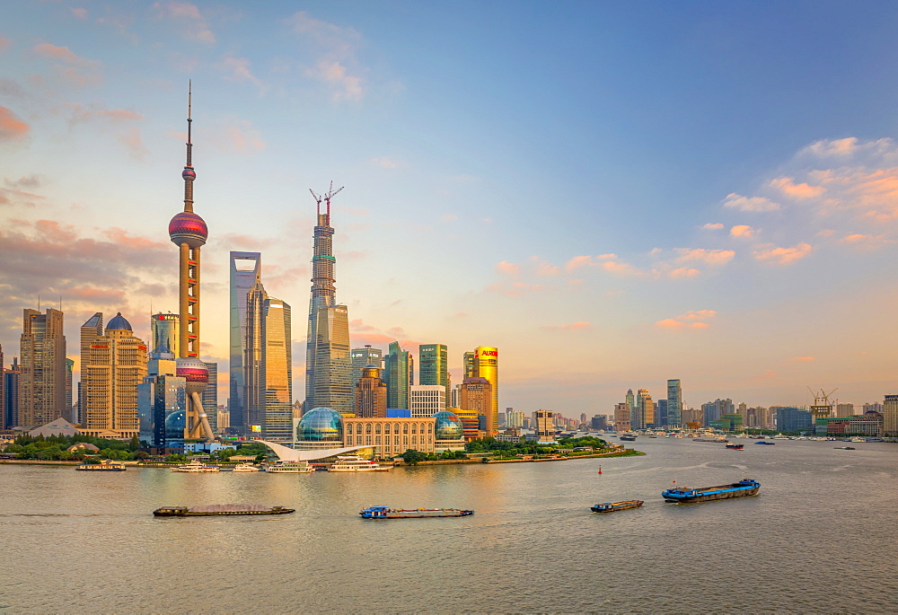 Pudong skyline across Huangpu River, including Oriental Pearl Tower, Shanghai World Financial Center and Shanghai Tower, Shanghai, China, Asia 