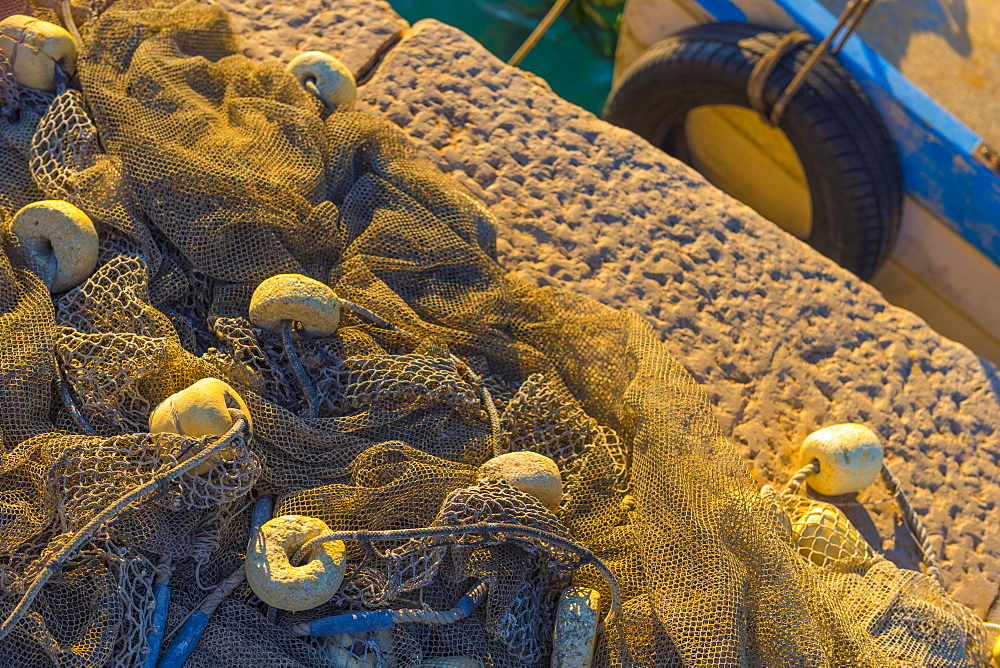 Fishing nets and fishing boat, Old Town Harbour, Piran, Primorska, Slovenia, Europe