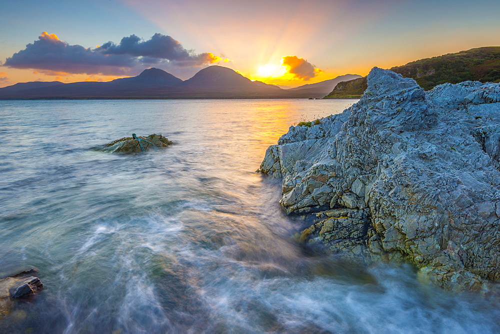 Isle of Jura and Paps of Jura Mountains across Bunnahabhain Bay and Sound of Islay from Islay, Argyll and Bute, Scotland, United Kingdom, Europe