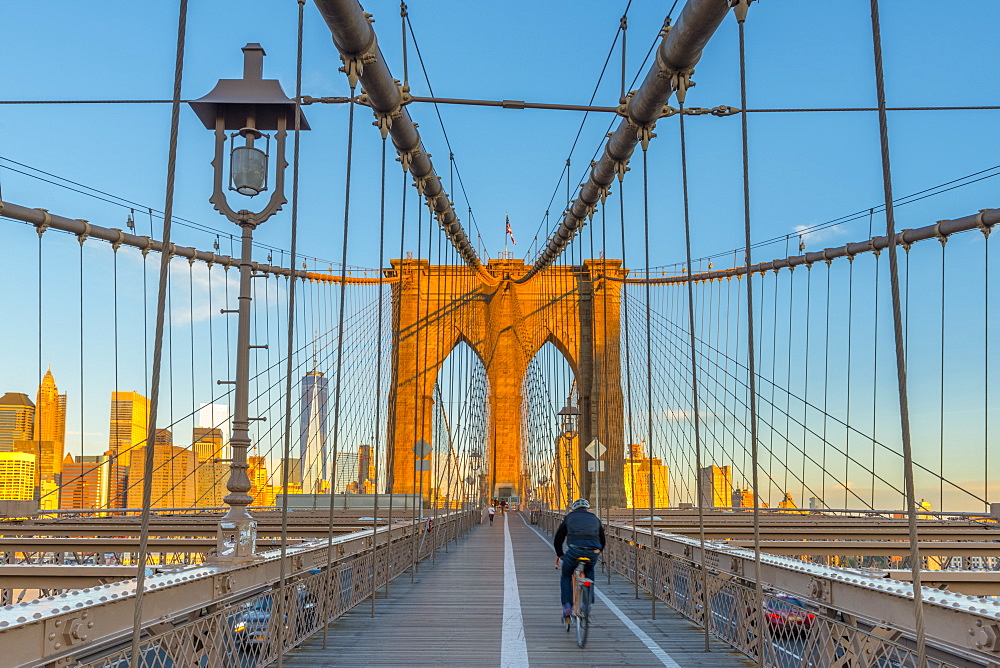 Manhattan, Brooklyn Bridge over East River, Lower Manhattan skyline, including Freedom Tower of World Trade Center, New York, United States of America, North America