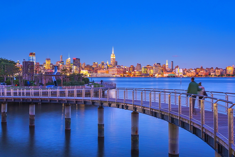 Manhattan, Lower Manhattan and World Trade Center, Freedom Tower in New York across Hudson River from Pier C Park, Hoboken, New Jersey, United States of America, North America