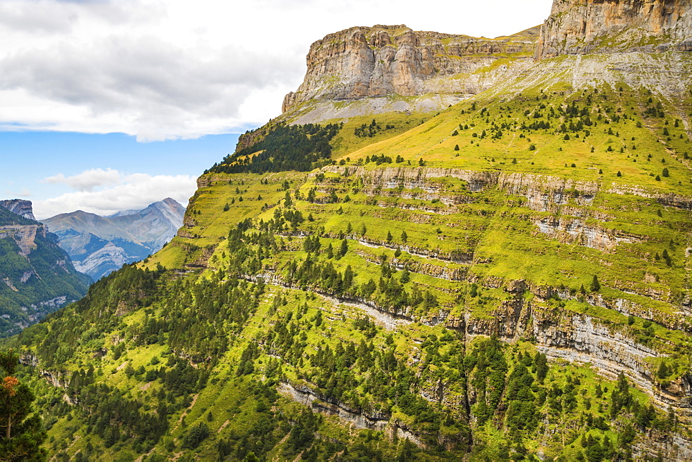 View west along the Ordesa Valley's north rim to distant Otal Peak, Ordesa National Park, Pyrenees, Aragon, Spain, Europe