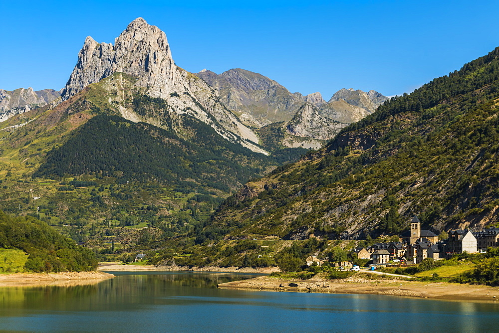 Lanuza lake and village and Pena Foratata peak in the scenic upper Tena Valley, Sallent de Gallego, Pyrenees, Huesca Province, Spain, Europe