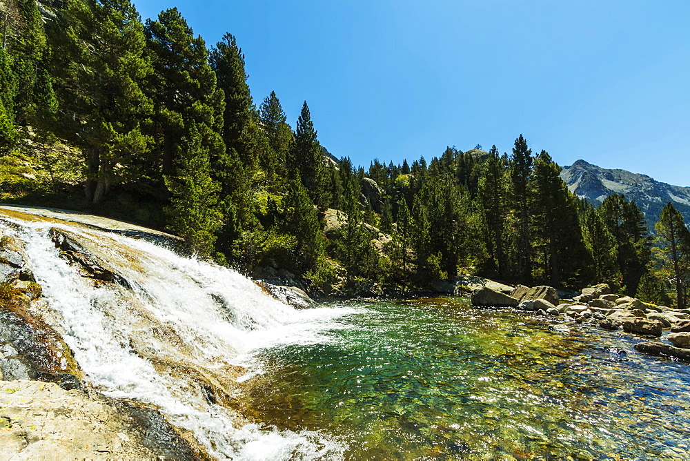 Waterfall below Llano de Bozuelo, Rio Caldares hiking trail from Banos de Panticosa, Panticosa, Pyrenees, Huesca Province, Spain, Europe