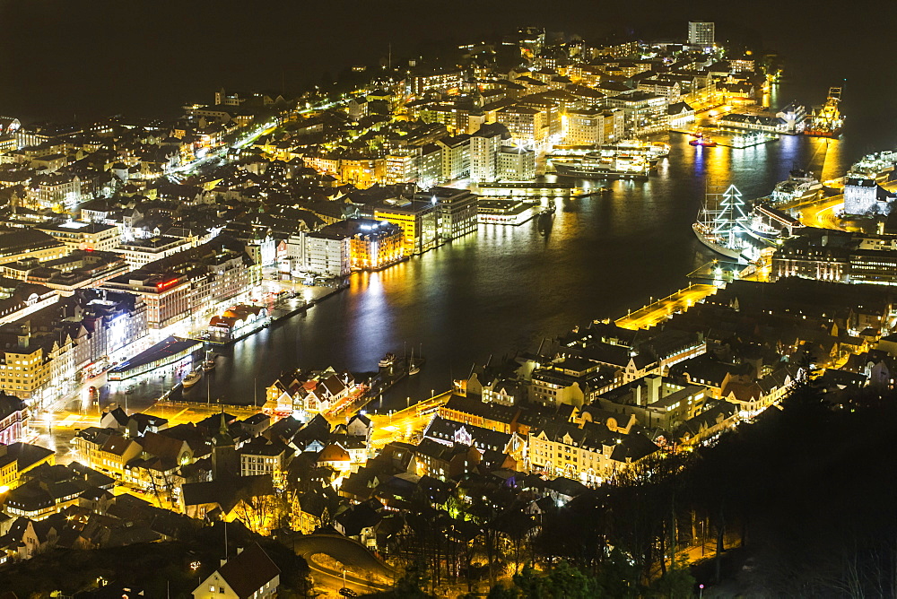 Night view of the city, Vagen Harbour and Puddefjord from the Mount Floyen funicular (Floibanen) station. Bergen, Hordaland, Norway, Scandinavia, Europe