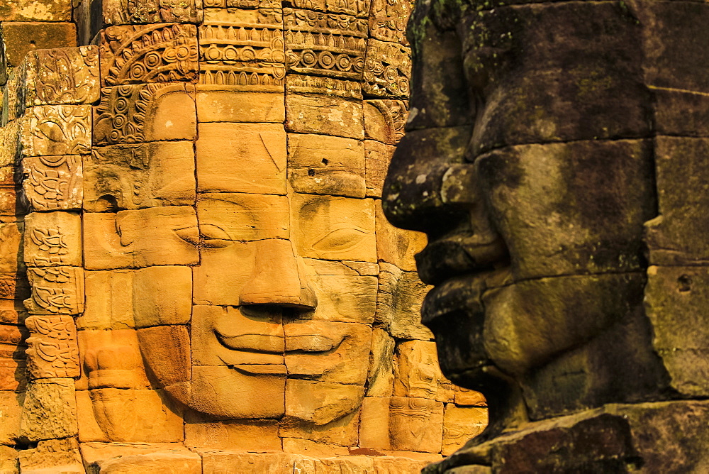 Two of 216 smiling sandstone faces at 12th century Bayon, King Jayavarman VII's last temple in Angkor Thom, Angkor, UNESCO World Heritage Site, Siem Reap, Cambodia, Indochina, Southeast Asia, Asia