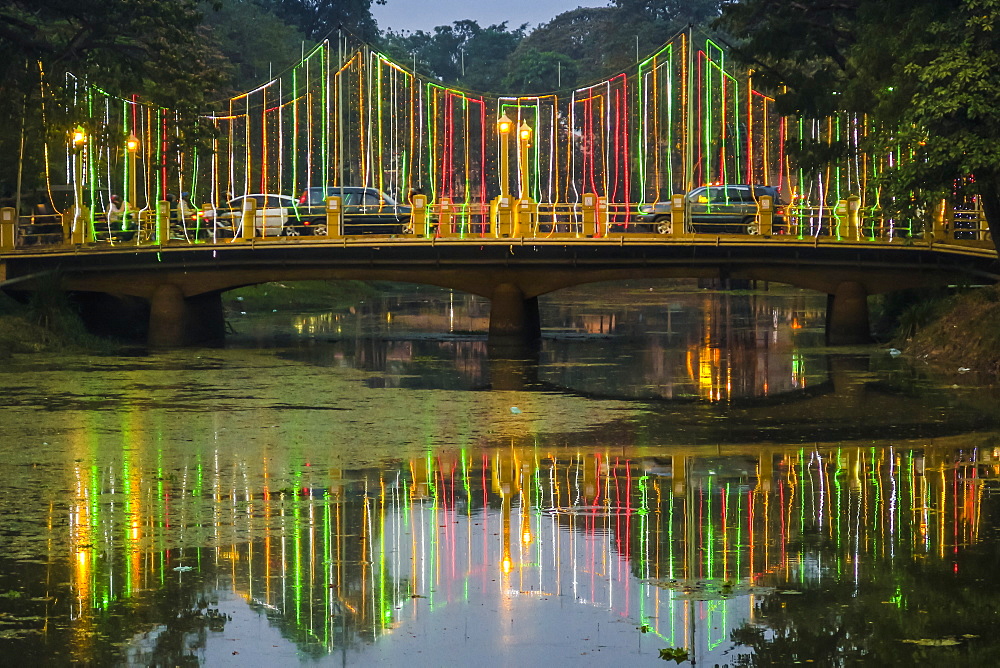 Lights and illuminated bridge on the Siem Reap River by the Art Center Night Market in this NW tourist town, Siem Reap, Cambodia, Indochina, Southeast Asia, Asia