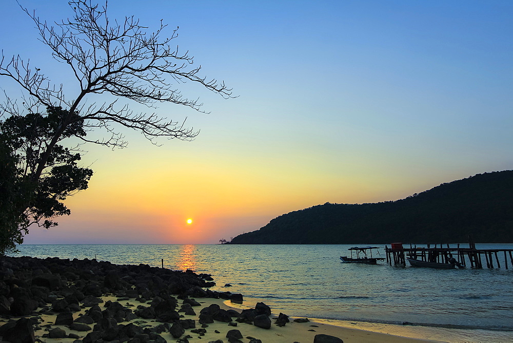 Sunset and pier on the quiet rocky west coast of this holiday island, Lazy Beach, Koh Rong Sanloem Island, Sihanoukville, Cambodia, Indochina, Southeast Asia, Asia