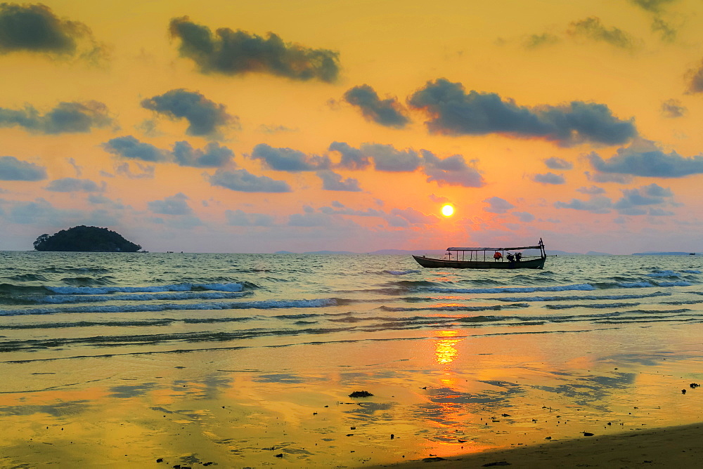 Fishing boat moored off beach south of the city at sunset, Otres Beach, Sihanoukville, Cambodia, Indochina, Southeast Asia, Asia