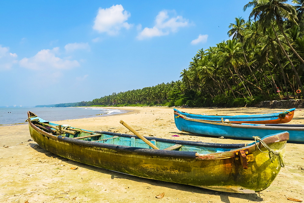 Fishing boats at lovely unspoilt, Kizhunna Beach, south of Kannur on the Keralan north coast, Kizhunna, Kannur, Kerala, India, Asia