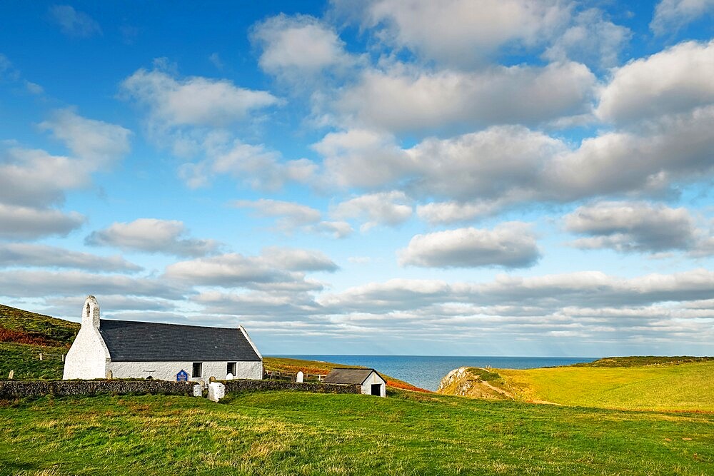 The 13th century Church of the Holy Cross, a Grade 1 listed parish church near popular Mwnt beach, Mwnt, Ceredigion, Wales, United Kingdom, Europe