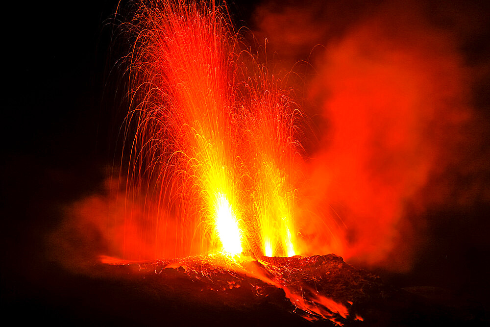 Lava bombs erupt from multiple vents on this volcano, active for at least 2000 years, Stromboli, Aeolian Islands, UNESCO World Heritage Site, Sicily, Italy, Mediterranean, Europe