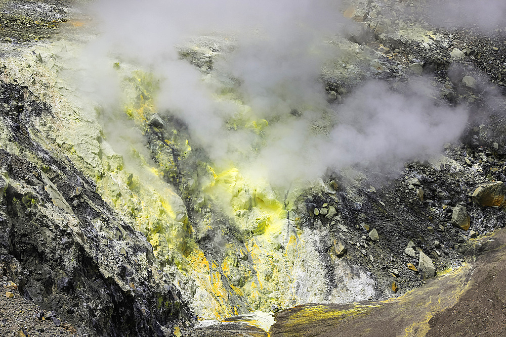 Steaming fumarole with sulphur deposits in Tompaluan active crater by Mount Lokon volcano near Tomohon city, Gunung Lokon, Tomohon, North Sulawesi, Indonesia, Southeast Asia, Asia