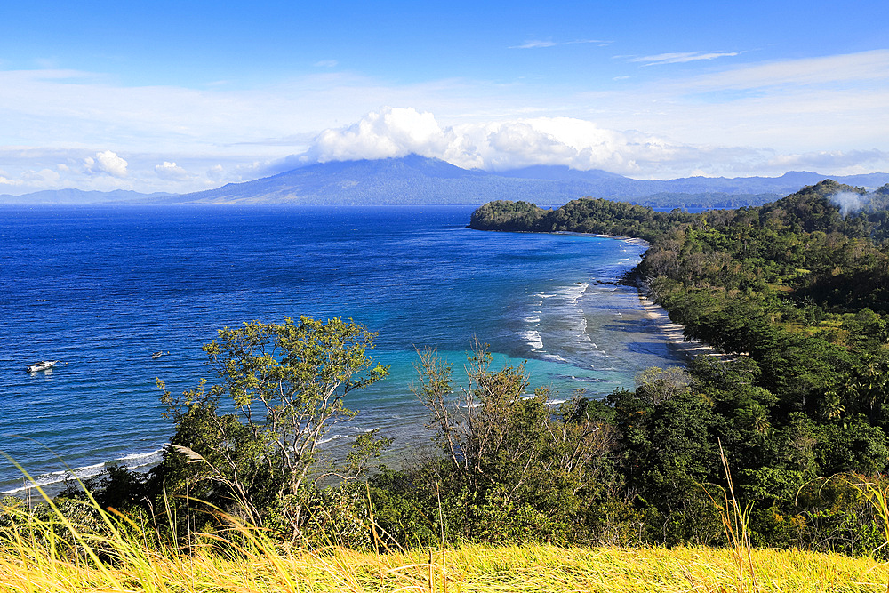 View south to Paal Beach and Tangkoko Nature Reserve beyond from Pulisan Resort and beach below, Pulisan, Minahasa Highlands, North Sulawesi, Indonesia, Southeast Asia, Asia