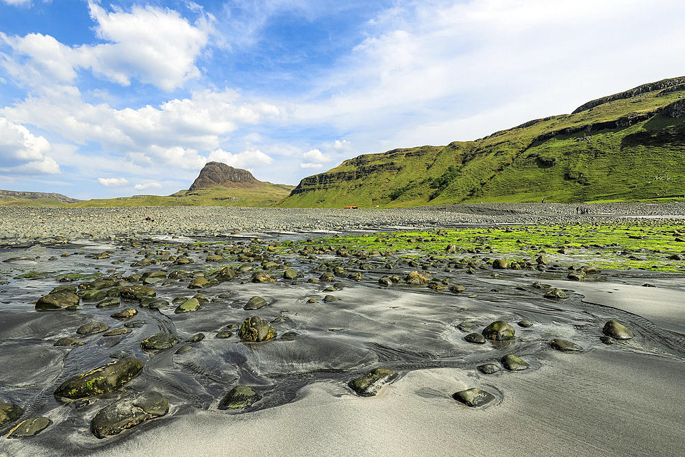 The white and black sand beach and estuary at Talisker with Preshal More beyond, both SSSI locations for the Tertiary basalt lava geology and biological habitats, Talisker Bay, Carbost, Skye, Inner Hebrides, Scotland, United Kingdom, Europe