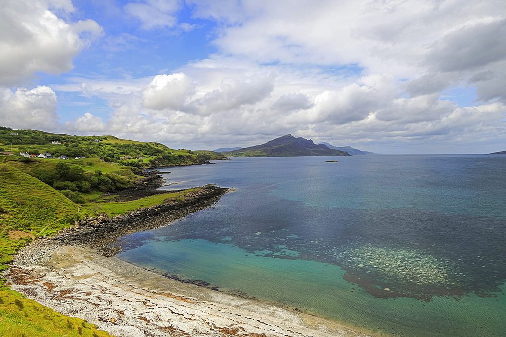 View north up the Sound of Raasay to Camustianavaig from Braes Beach on its narrow sandy isthmus,. The Braes, Portree, Skye, Inner Hebrides, Scotland, United Kingdom, Europe