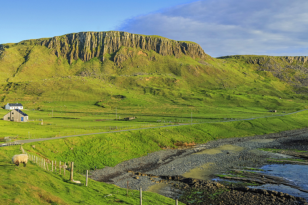 Igneous sill forms a rocky backdrop to Duntulm and on the beach Jurassic sedimentary rocks yield fossils & dinosaur footprints at this SSSI locality. Duntulm, North West Trotternish, Skye, Inner Hebrides, Skye, Scotland, United Kingdom, Europe