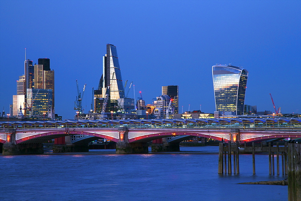 Blackfriars Bridge and River Thames at dusk, taken from South Bank, with Walkie-talkie, Cheesegrater and City of London, London, England, United Kingdom, Europe