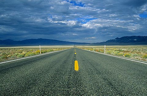 Lonely highway trough Goshute Valley, Nevada, USA