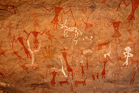 Neolithic rock drawing of humans and animals Acacus Libya