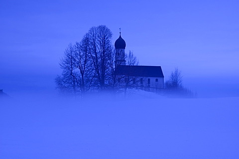 Church with fog in Oberbuchen near Bad Heilbrunn south of Munich Bavaria