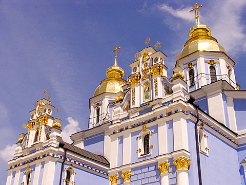 Ukraine Kiev golden domes from St. Michel Monastery golden domes and crosses shines in sunlight wall paintings Fresken with blue sky 2004