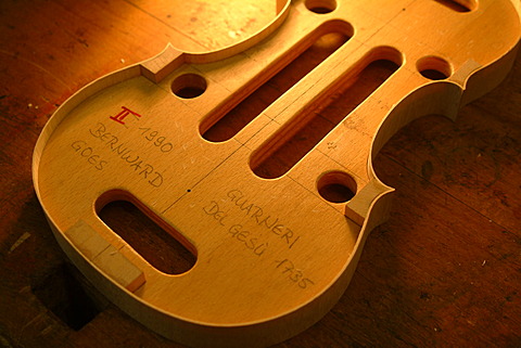 Violin mold and tools used for making an Italian-style violin