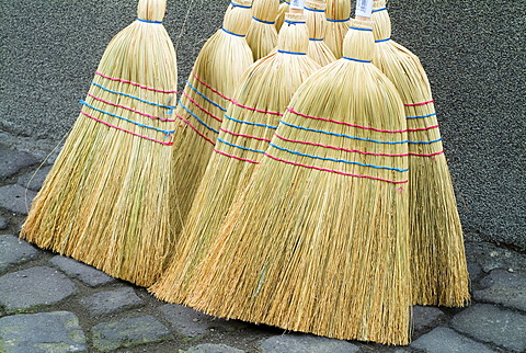 Birch Brooms on a Market