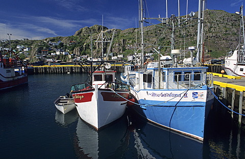 Houses and fishing boats in the harbor of St JohnÂ´s, Newfoundland