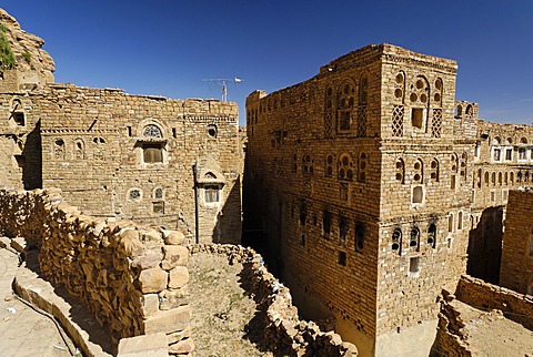 Decorated stone houses in the old town of Thula, Yemen