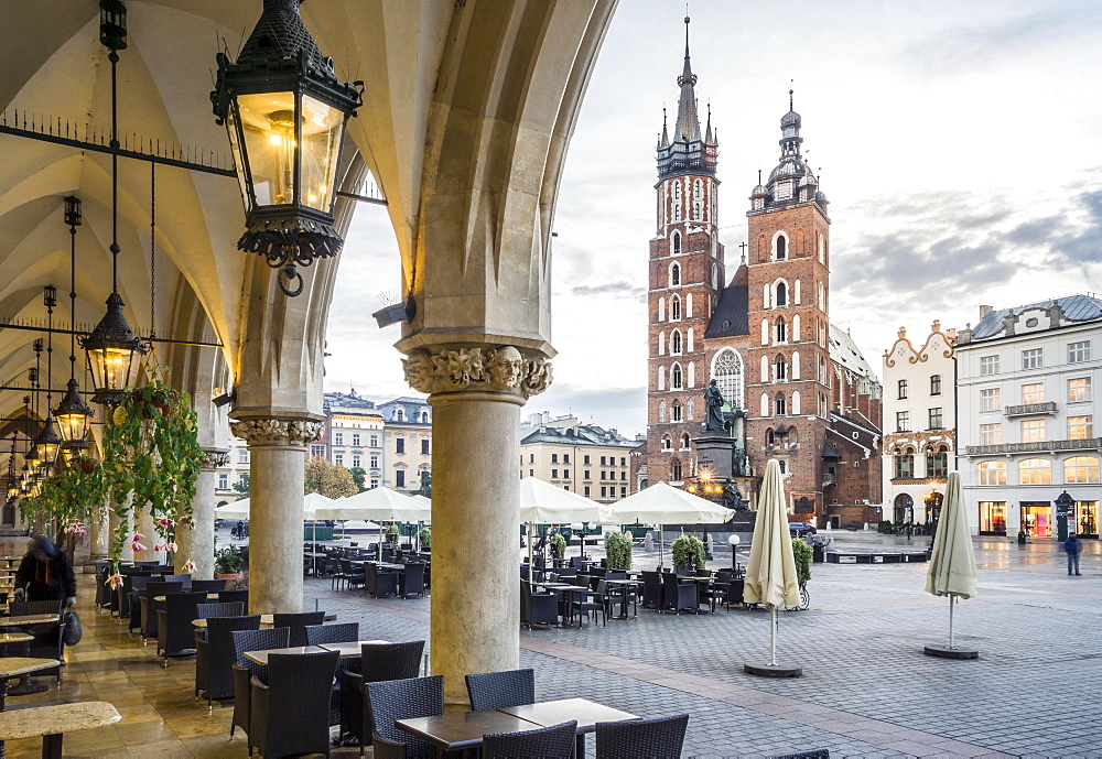 Cloth Hall and Saint Mary's Basilica on main Market Square in Krakow, Poland, Europe