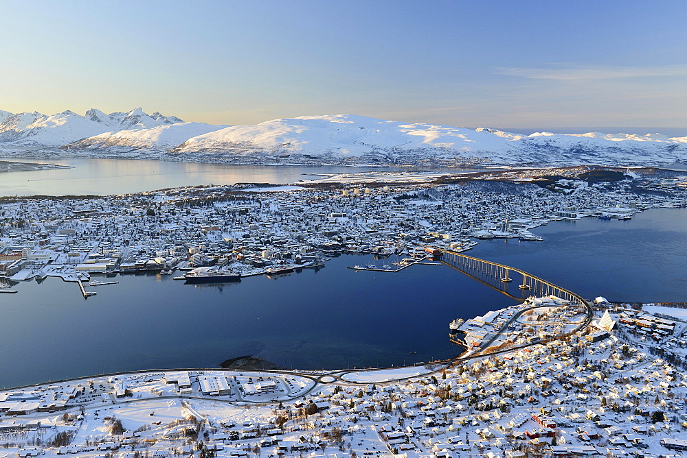 Snowy town with bridge, islands in the North Sea, Tromso, Tromsoysund, Troms, Norway, Europe