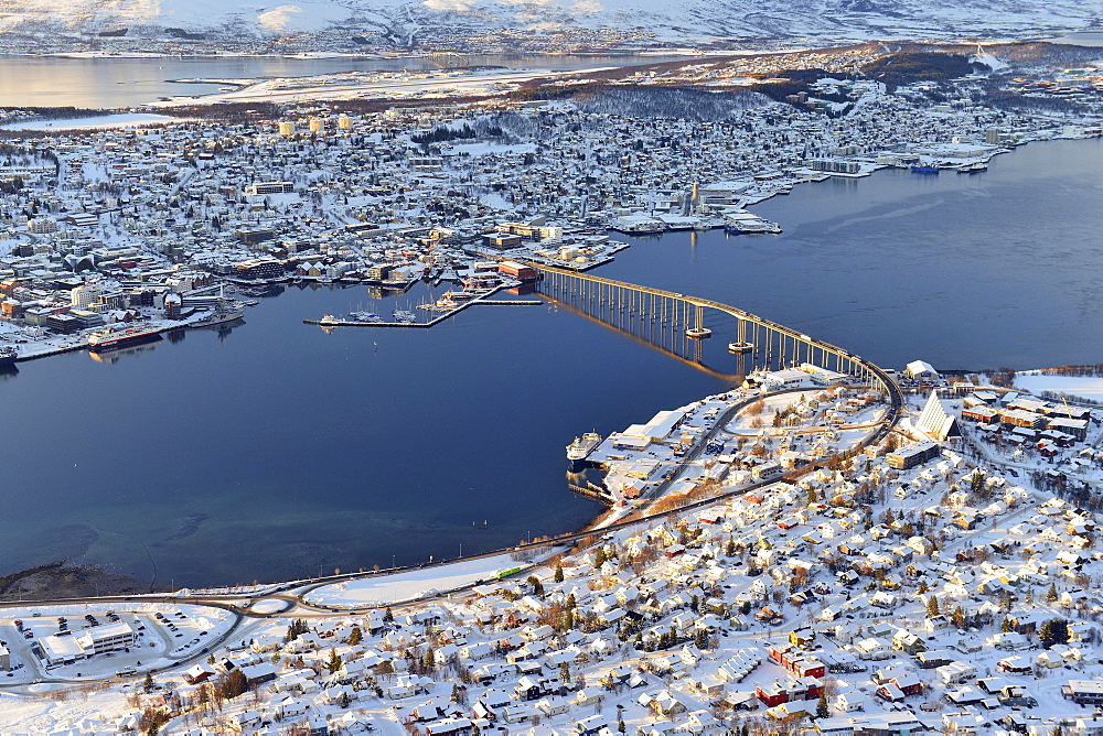 Snowy town with bridge, Tromso, Tromsoysund, Troms, Norway, Europe