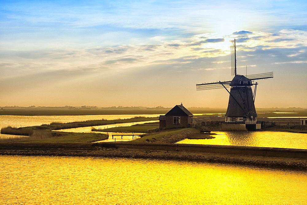 Historic water mill in evening twilight, Texel, North Holland, Netherlands