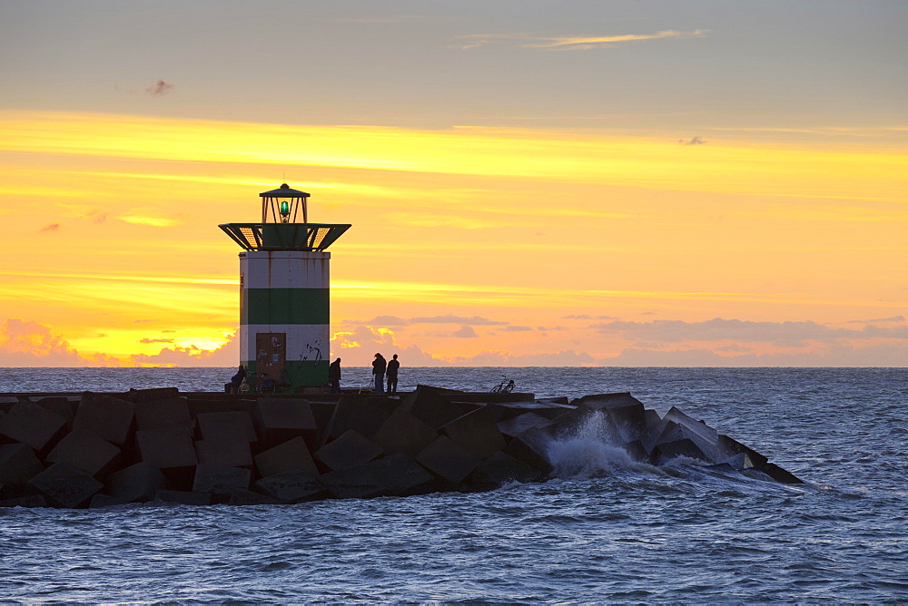 Small lighthouse at harbor entrance, sunset, Scheveningen, The Hague, Holland, The Netherlands, Europe