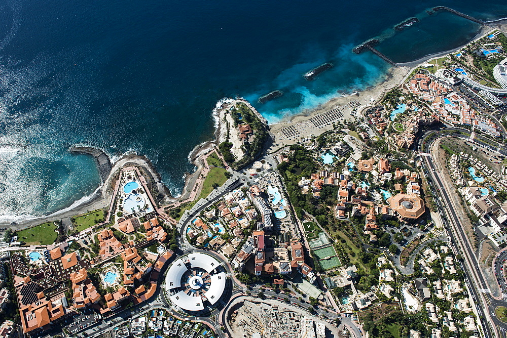 Seaside resort with beach and promenade by the sea, Playa del Duque, townscape with hotels and shopping malls, tourist area, south coast, Costa Adeje, Tenerife, Spain, Europe