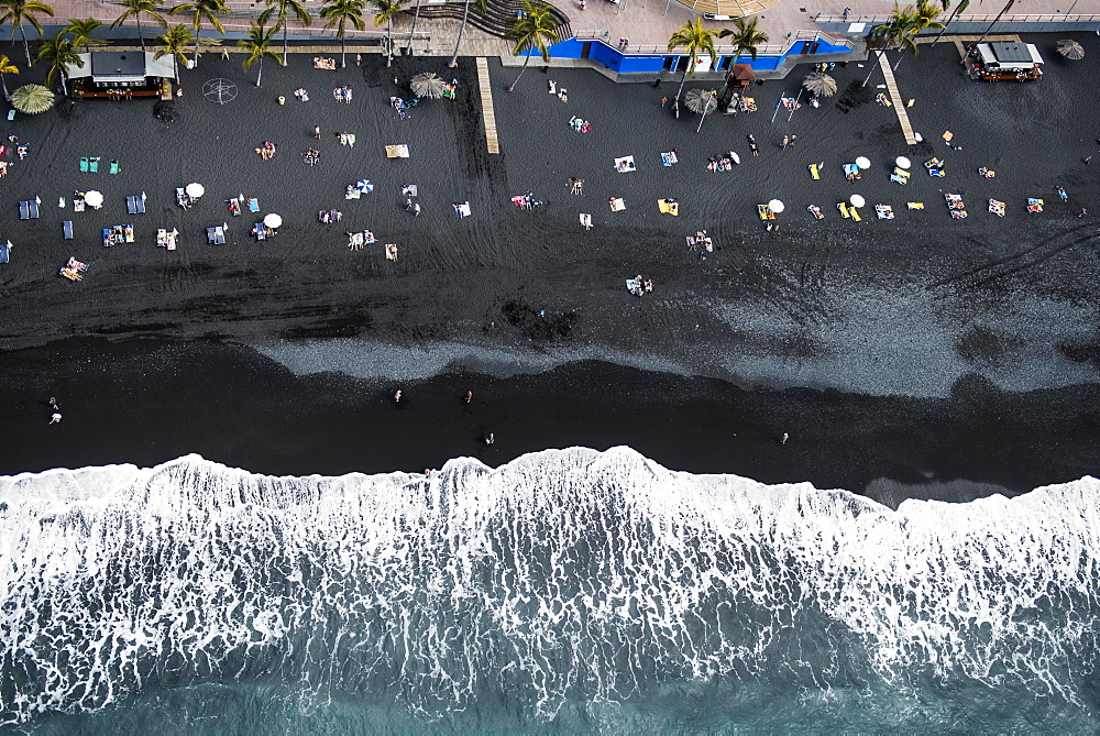 Surf, bathing people on black lava beach, Puerto Naos, La Palma, Canary Islands, Spain, Europe