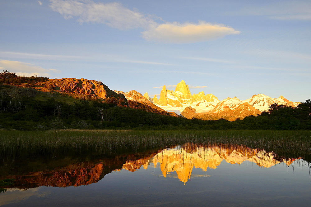 Mountain range with Cerro Fitz Roy at sunrise reflected in Lago de Los Tres, Los Glaciares National Park, El Chaltén, Santa Cruz Province, Patagonia, Argentina, South America