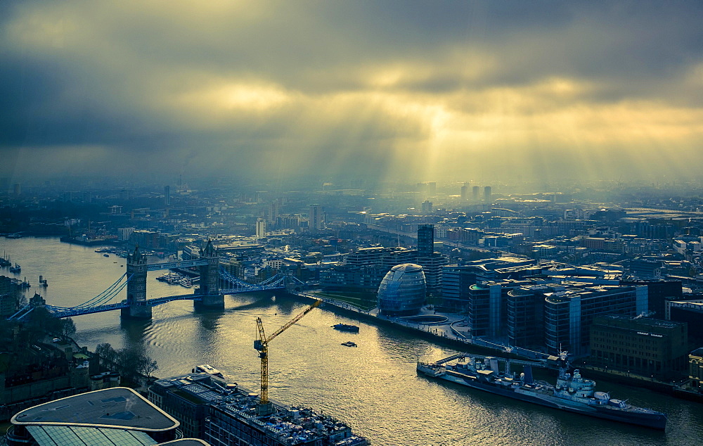 View of Tower Bridge and Thames with dramatic lighting, London, Great Britain