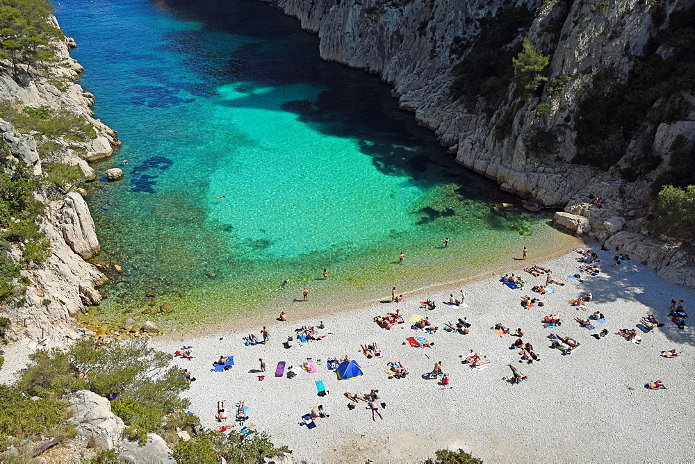 Tourists at beach with turquoise water, Calanque d'en Vau, Calanques National Park, Provence, France, Europe