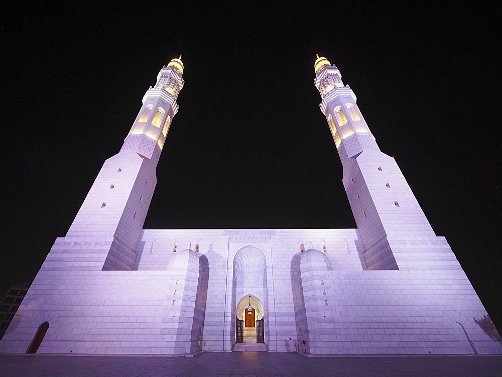 Night view of the Mohammed Al Ameen Mosque with minaret, illuminated, Muscat, Oman, Asia