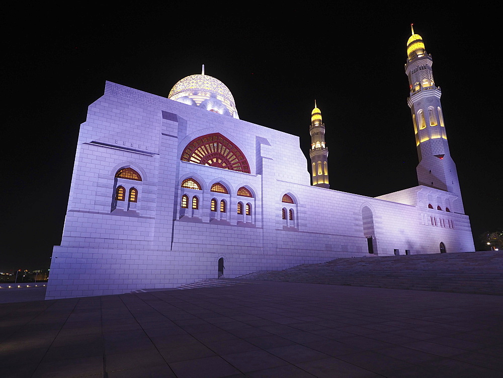 Night view of the Mohammed Al Ameen Mosque with minaret, illuminated, Muscat, Oman, Asia