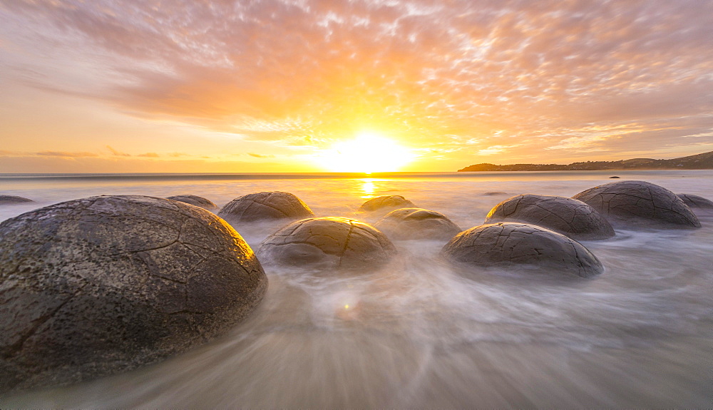 Moeraki boulders, at sunrise, geological formation, Koekohe Beach, Moeraki, East Coast, Otago, South Island, New Zealand, Oceania