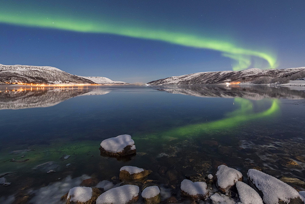 Northern lights reflected in fjord, island of Senja, Troms, Norway, Europe