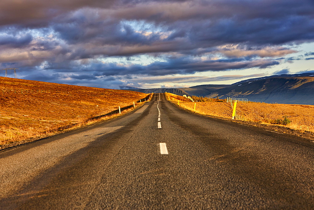 Lonely road, clouds, Hvanneyri, Mosfellsbæ, Island