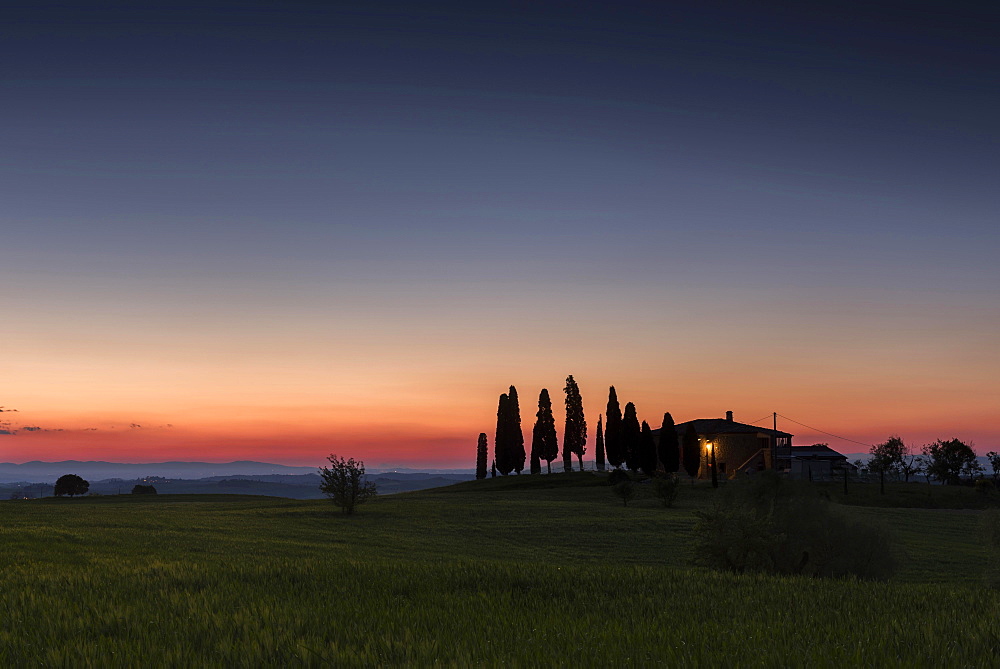 Tuscan landscape with house and cypresses, sunset, San Quirico d'Orcia, Val d'Orcia, Tuscany, Italy, Europe